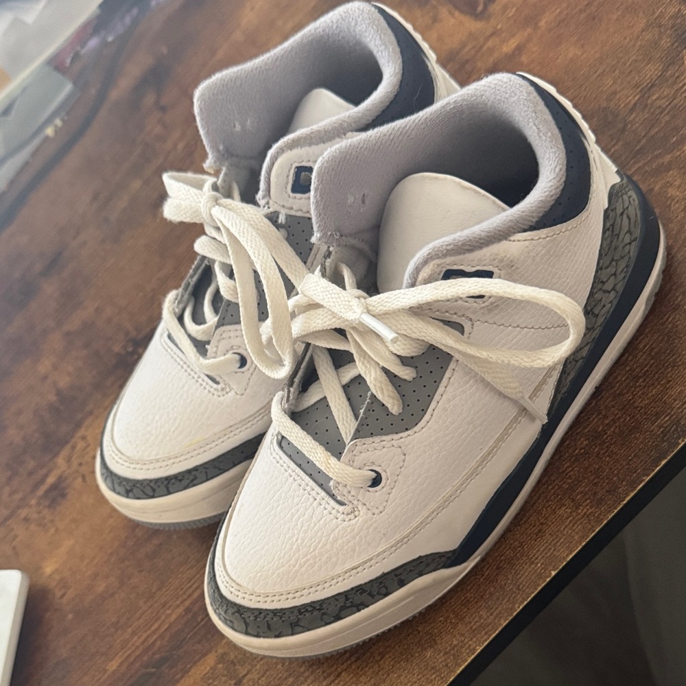 White and blue jordans 4 retro